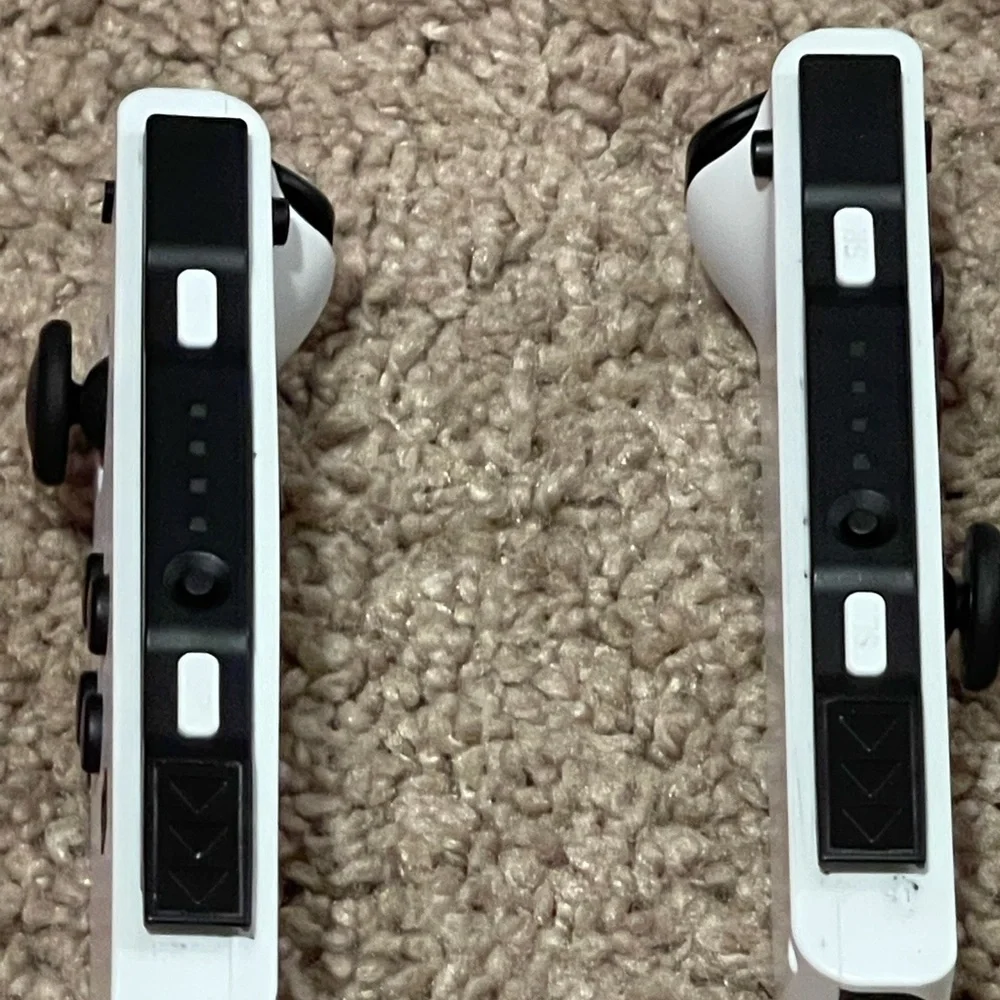 Nintendo Switch White OLED Joy-Cons with side straps